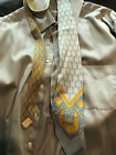 Light blue and gold Versace necktie made in Spain and in very good condition