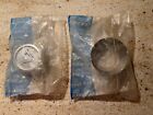 2 NOS VOLVO 240 STAINLESS STEEL CENTER CAPS  1206278