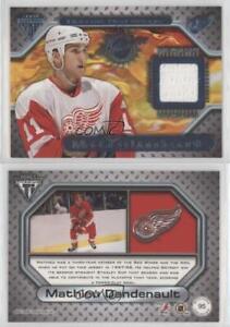 New Listing2000-01 Pacific Private Stock Titanium Game-Used Gear Mathieu Dandenault #95