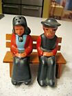 Vintage Mormon Man and Woman Sitting on Bench Salt and Pepper Shakers
