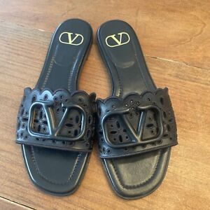 VALENTINO GARAVANI black leather logo sandals gold accent size 37 MSRP $1,000.