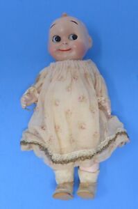 New ListingCirca 1900s Bisque Head Composition Body KEWPIE Glass Eyes Jointed Arms Leg Doll