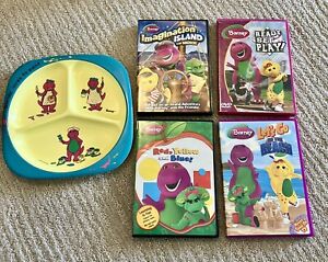 Lot Of 4 Barney DVD’s And “Barney Loves To Paint” Plate.