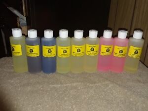 -Wholesale body oils( 9) 4oz bottles of top selling perfumes and 144 bottles.