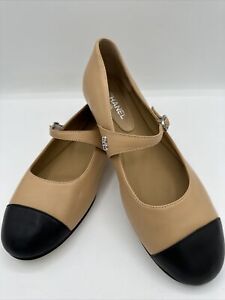 Elegant Chanel Tan With Black Round Toe Mary Janes