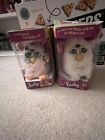 2 furbys 1998 working in box with attached tags and instructions