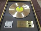 MADONNA GOLD RIAA RECORD AWARD PRESENTED TO KEN PUVOGEL SIRE RECORDS