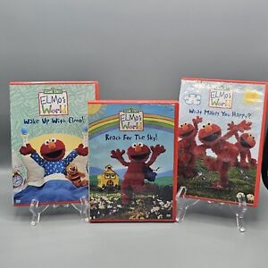 Elmo’s World DVDs Wake Up With Elmo! Reach For The Sky! What Makes You Happy?