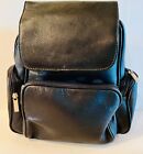 Leather backpack/handbag with front flap pocket, two side pockets, back pocket