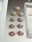 Lot of 9 Chanel buttons