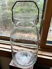 rare one-gallon Owens-Illinois clear glass jar with wire bail