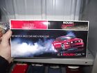 TEAM CALIBER INC ROUSH 2005 FORD MUSTANG RED/BLACK 1/18 Red