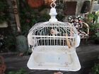 antique EARLY HENDRYX Metal Bird Cage w/2 MILK GLASS feeders, Chippy White Paint