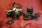 CAMERA OLYMPUS OM 10 WITH LOT OF LENSES