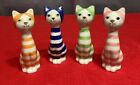 Four  Ceramic Cats 4-1/2 Tall