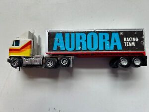AURORA AFX GMC Cabover Yellow/ Orange Stripe / Aurora Racing Team Trailer