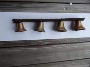 4 SLEIGH BELLS OF DIFFERENT SIZES WITH LEATHER HOLDER