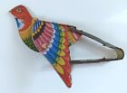 Vintage and Nice Litho Tin Metal Squeeze Bird Toy Moves Wings---Working Great