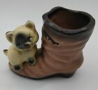 New ListingVintage Ceramic Cat sitting on Toe of Boot Figurine  Curious Kitty Animal Statue