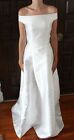 Beautiful, classic custom a-line silk wedding dress with detachable train