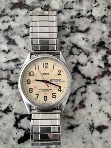 Vintage Lorus Men’s Wrist Watch Steel Yellow Dial Date Lumibrite Water Resistant