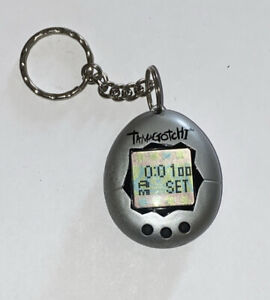 Vintage Bandai Tamagotchi 1997 Silver  Virtual Keychain Pet WORKS