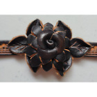 Leather Rosette Bracelet with Snap Closure & Carved Music Notes on Band