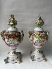 Pair of Dresden porcelain covered urns/ vases
