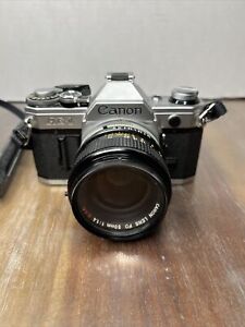 New ListingCanon AE-1 35mm SLR Film Camera w/ 50mm FD lens Kit - Tested & Working Great!