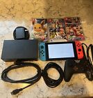 Nintendo Switch 32GB Gray Console with Neon Red and Neon Blue Joy-Con Bundle