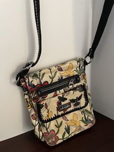 Sakroots Crossbody Purse. Laminated Peace/Birds Design. 9x8x2 Pre-Owned.
