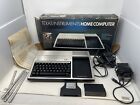 Ti99/4a Computer PHC004A with Box + Power Supply with extender and 2 Games *read