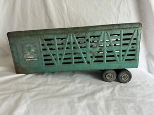 Vintage green metal Structo stock trailer with yellow doors
