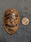 Vintage Obsolete “WELLS FARGO SECURITY SERVICES” Metal Gold Tone Officers Badge