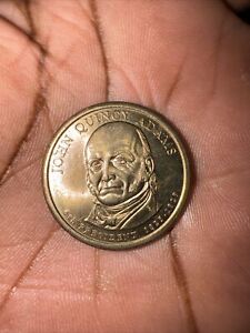 Rare 1825-1829 John Quincy Adams one dollar coin.