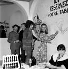 Claude Jade signs the wall of a restaurant during a party during t- Old Photo 1