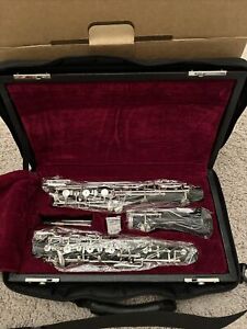 Muslady oboe with case, reed, and accessories - used 3 times - very new