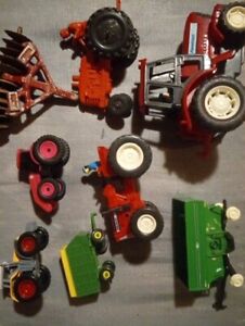 Toy Tractor Lot Plastic And Diecast.          B