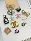 Lot of 12 Chanel buttons and zipper Pulls
