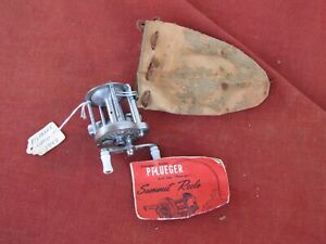Vintage Pflueger Summit 1993L casting reel with case and paperwork.
