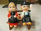 Vintage Boy and Girl with Baskets Sitting on Bench Salt and Pepper Shakers