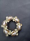 Vintage goldtone wreath brooch with faux pearls and clear rhinestones