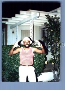 New ListingFOUND COLOR PHOTO H+5355 BEARDED BLACK MAN POSED SMILING WITH HANDS UP