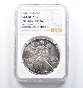 Unc Details 1986 American Silver Eagle - Artificial Toning - Graded NGC *382