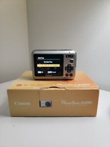 New ListingCanon PowerShot A495 10.0MP Digital Silver Camera + Cables Manuel Boxed Works