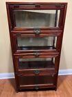 Vintage wooden display cabinet with copper fish padlock