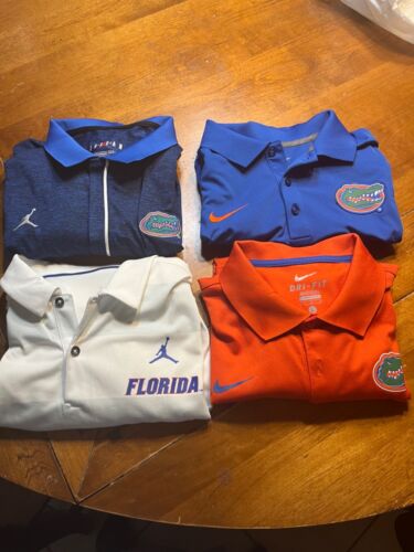 New ListingSet of 4 Florida Gators polo shirts Jordan  and Nike size large excellent cond.