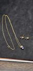 14k gold purple tanzanite and diamond stud earrings and pendant necklace