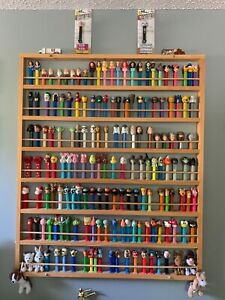 New ListingLot of 165 PEZ Dispensers with Wooden Wall Rack