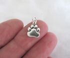 Sterling Silver dog paw small charm.